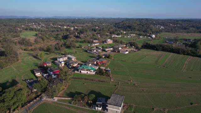 Aerial View of Rural Valley Community and Farmland