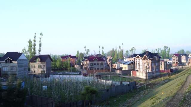 Scenic Village Landscape with Residential Architecture in Kashmir India