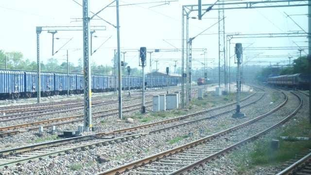 Industrial Railway Yard with Freight Wagons and Complex Track Infrastructure