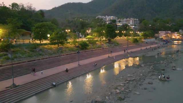 Aerial Dusk View of Rishikesh Riverbank Ghats in India